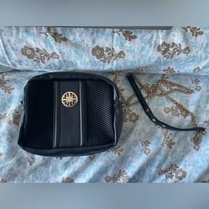 Black purse with gold accent